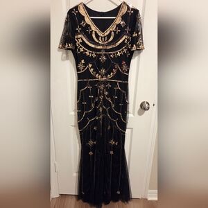 Elegant Black and Gold Embellished Dress